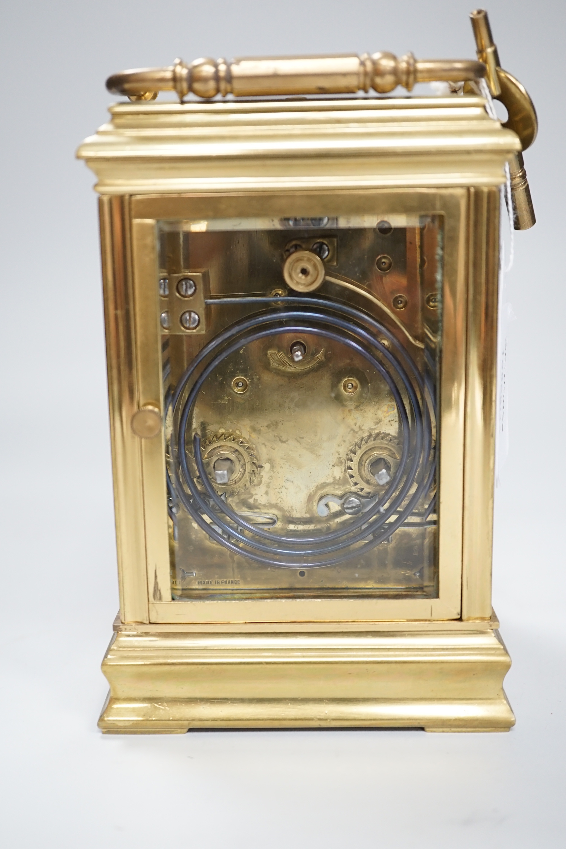 An hour repeating brass carriage clock with key, 16cm